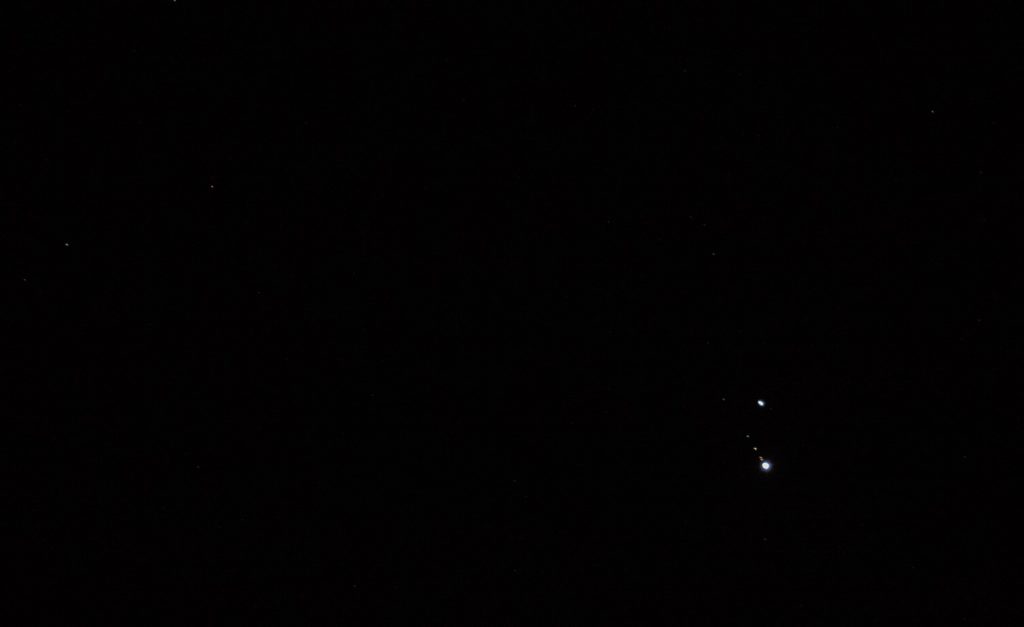 Saturn (above) & Jupiter (below) a Few Days From Conjunction. The star Altair is to upper right and the star Formalhaut is out to the left. Four moons of Jupiter are visible at the 11:00 o'clock position.